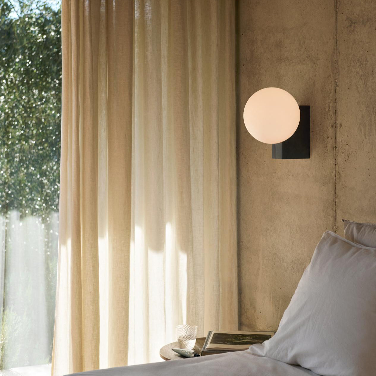 &Tradition, a Danish design brand that merges traditional craftsmanship with contemporary aesthetics, featuring furniture, lighting, and home accessories with timeless appeal.
