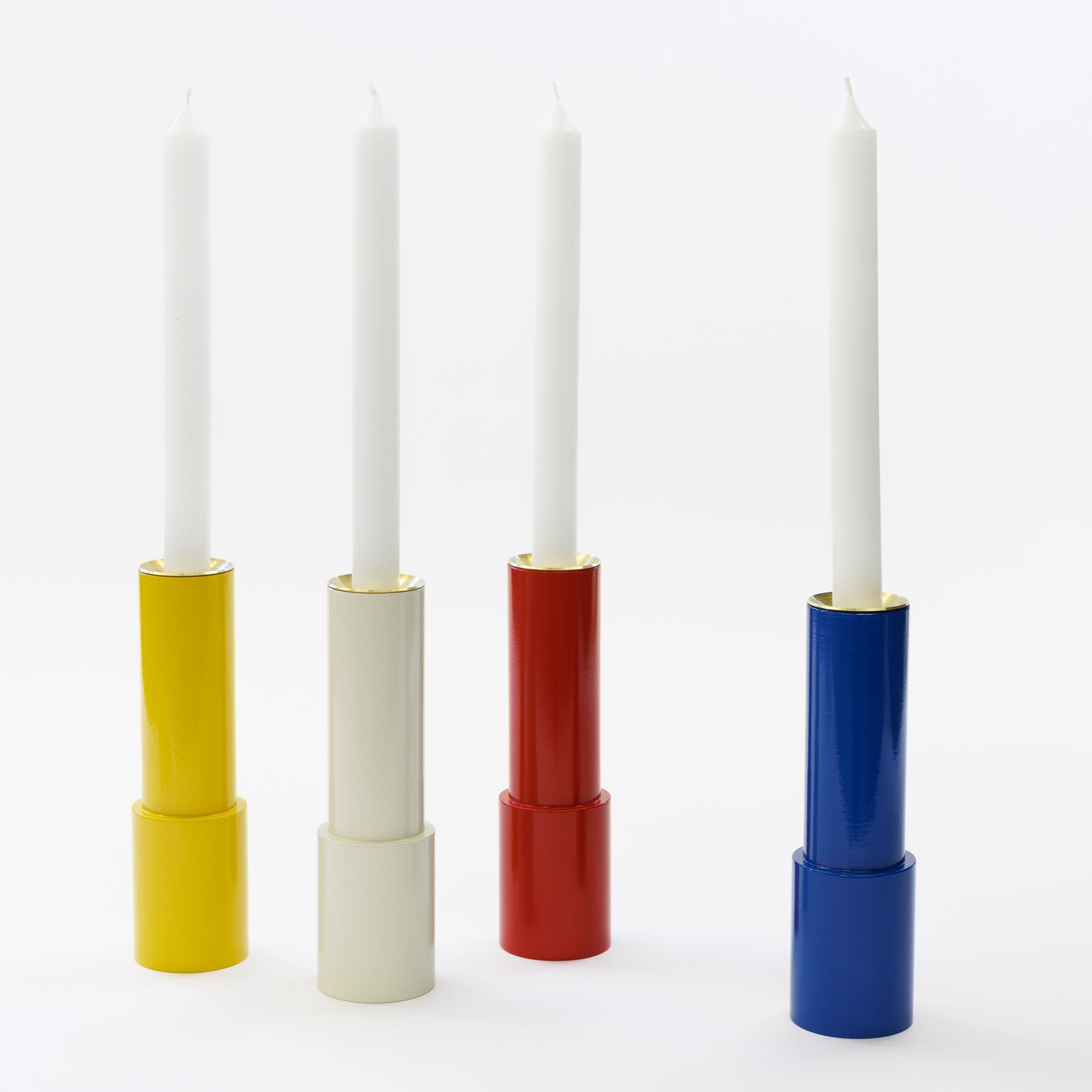 Sophie Tauber-Arp Wooden Candlestick, an artistic and minimalist design inspired by the work of Swiss artist Sophie Tauber-Arp, featuring smooth, geometric shapes and crafted from high-quality wood for an elegant, timeless look.