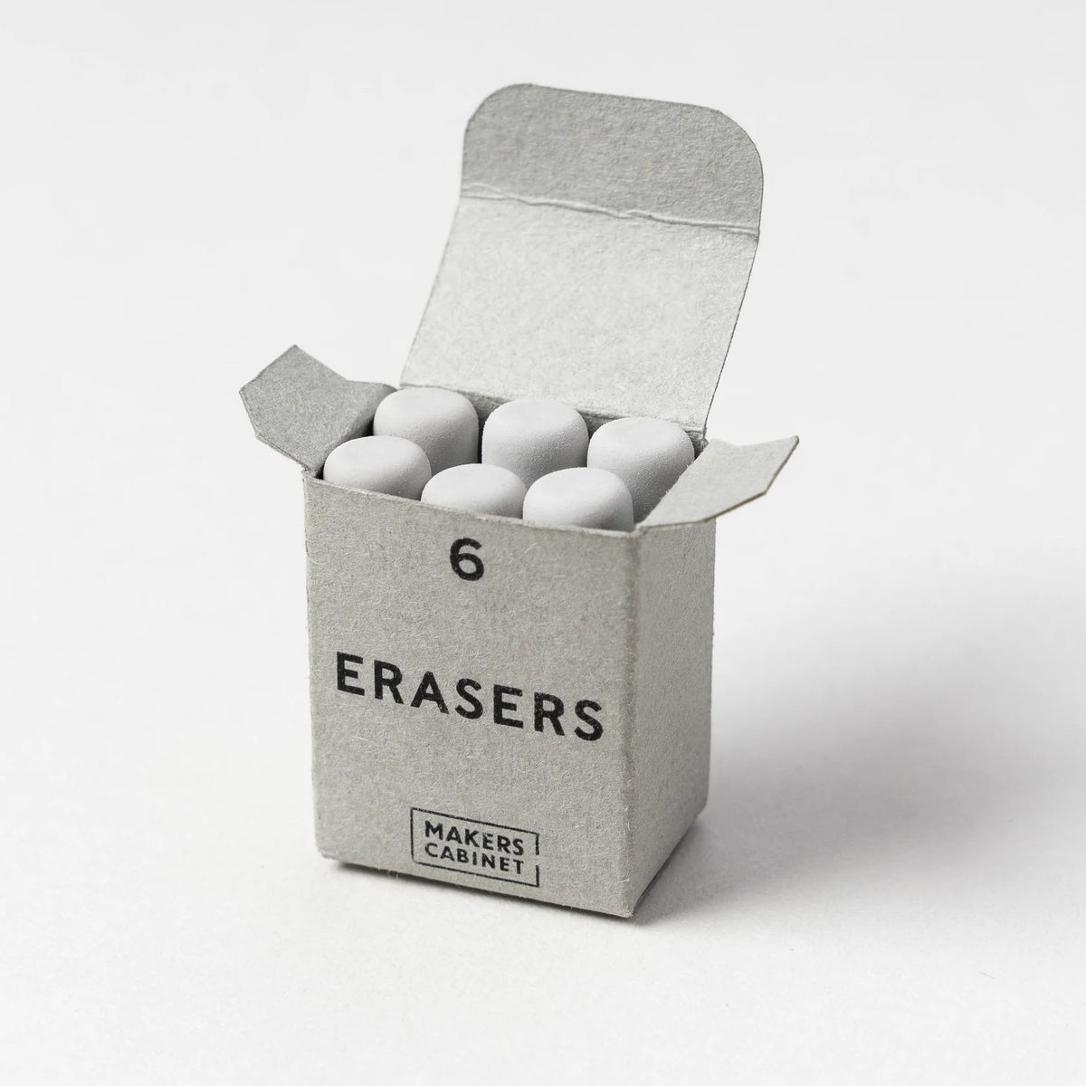 Box of erasers with 'Makers Cabinet' branding on a white background
