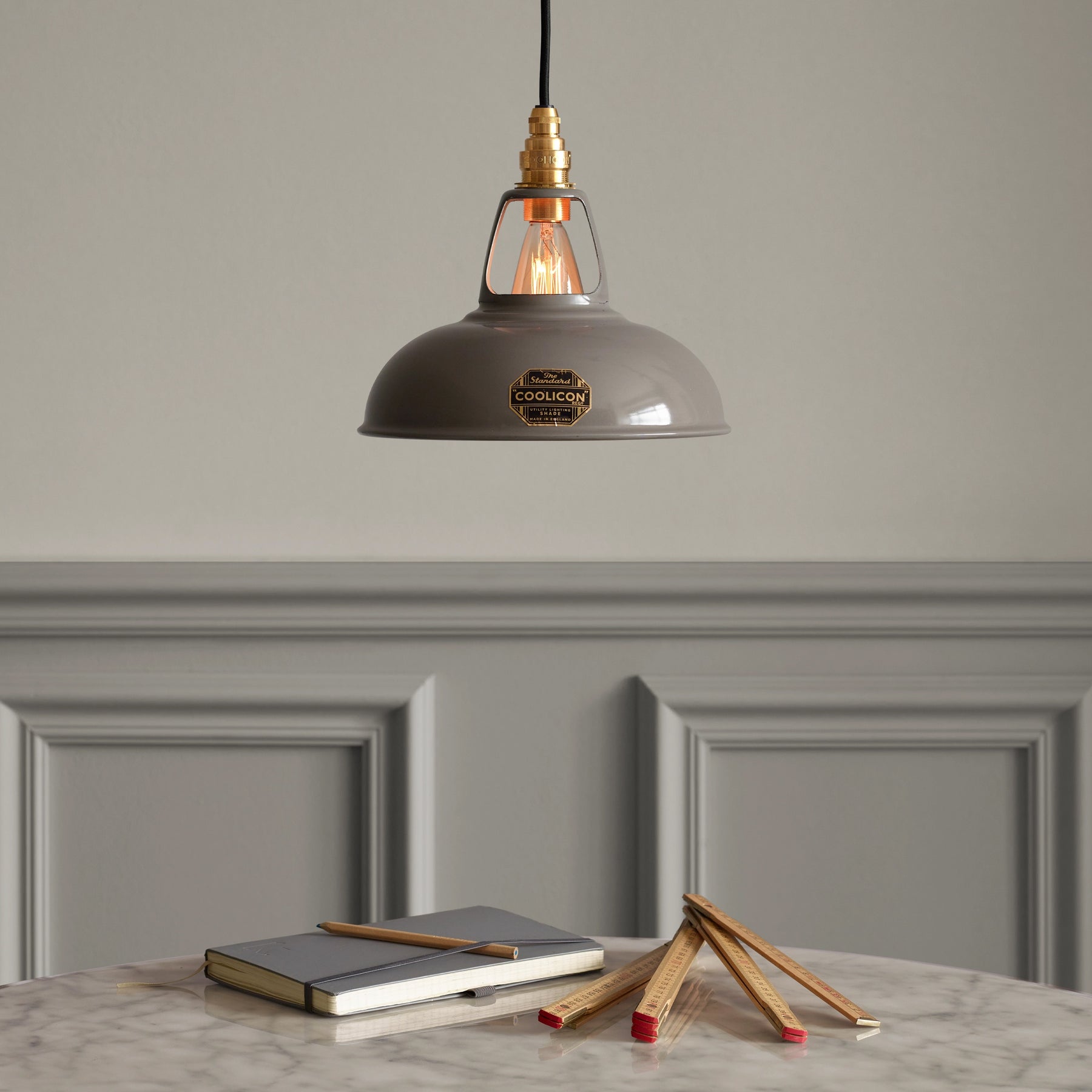 Coolicon, a classic British lighting brand known for its industrial-style pendant lights, combining retro charm with modern craftsmanship for a timeless and functional design.