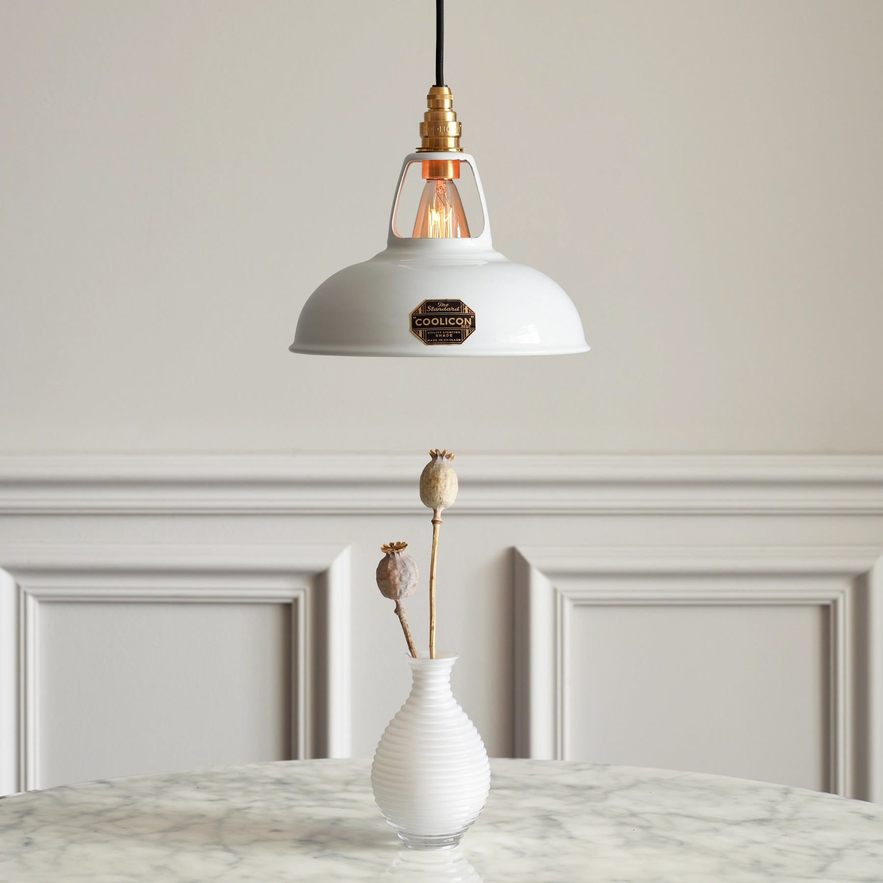 Coolicon, a classic British lighting brand known for its industrial-style pendant lights, combining retro charm with modern craftsmanship for a timeless and functional design.