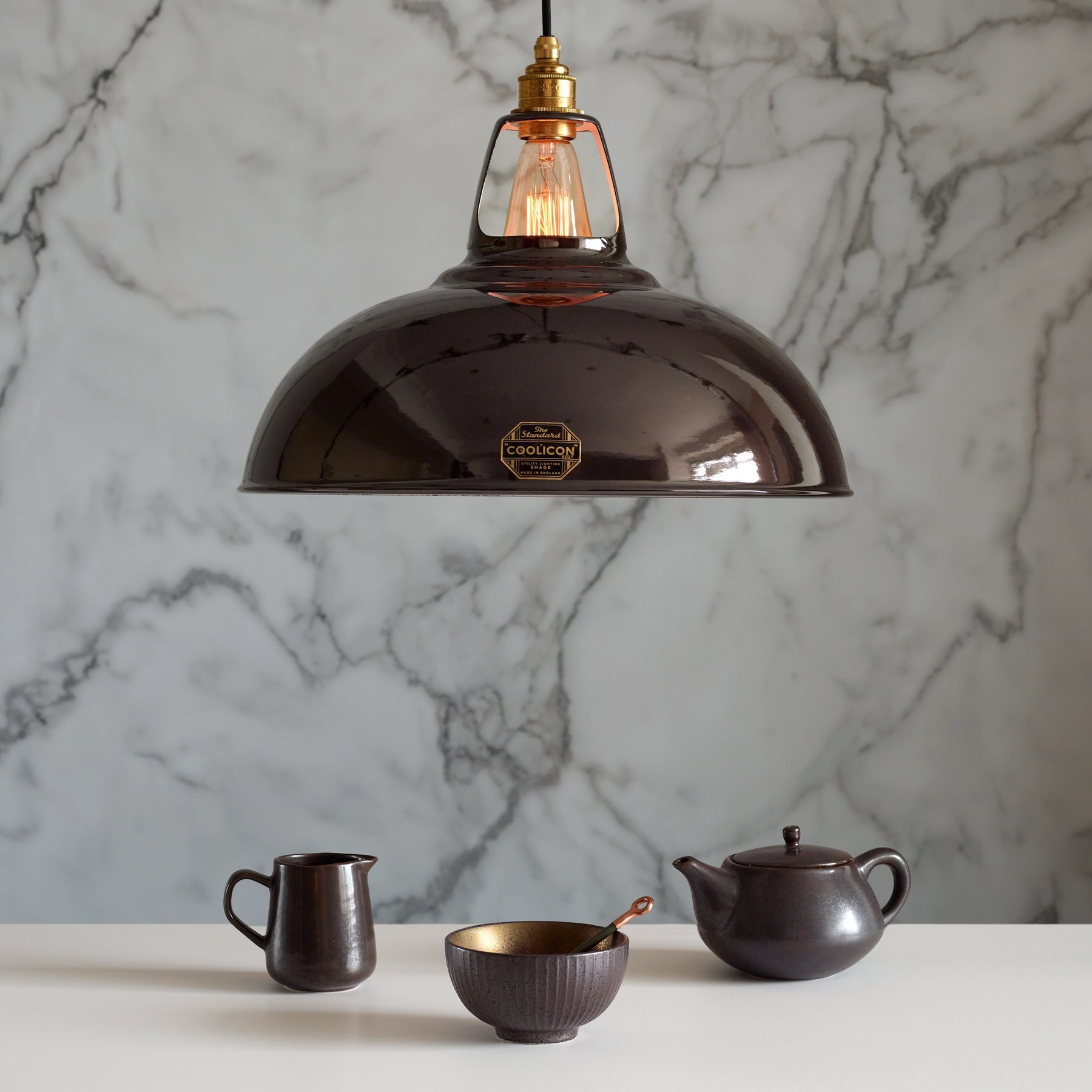 Coolicon, a classic British lighting brand known for its industrial-style pendant lights, combining retro charm with modern craftsmanship for a timeless and functional design.