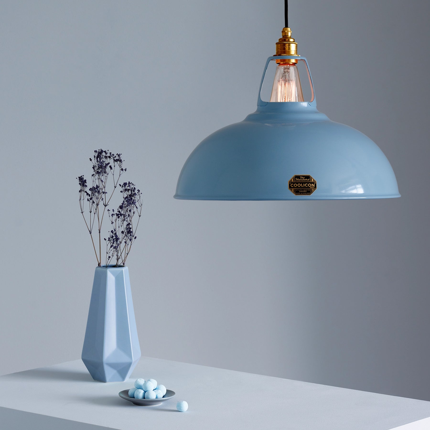 Coolicon, a classic British lighting brand known for its industrial-style pendant lights, combining retro charm with modern craftsmanship for a timeless and functional design.