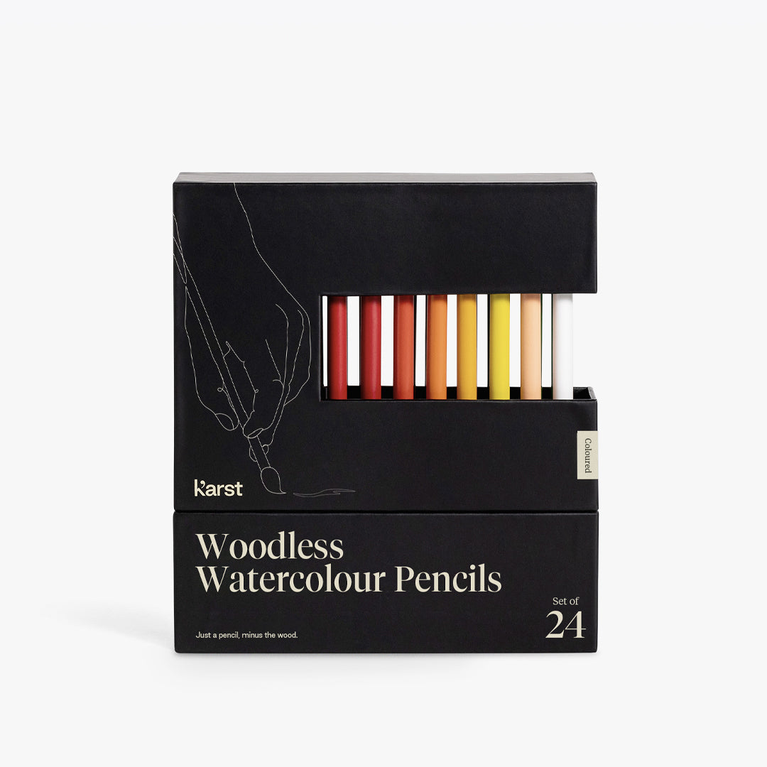 Karst woodless watercolour pencils set of 24 in a black presentation box, with a window revealing assorted coloured pencils, photographed on a white background.