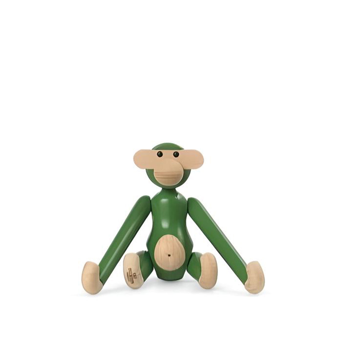 Kay Bojesen, a Danish designer renowned for his playful and iconic wooden figurines, including the beloved wooden animals and figurines that blend craftsmanship with a joyful aesthetic.