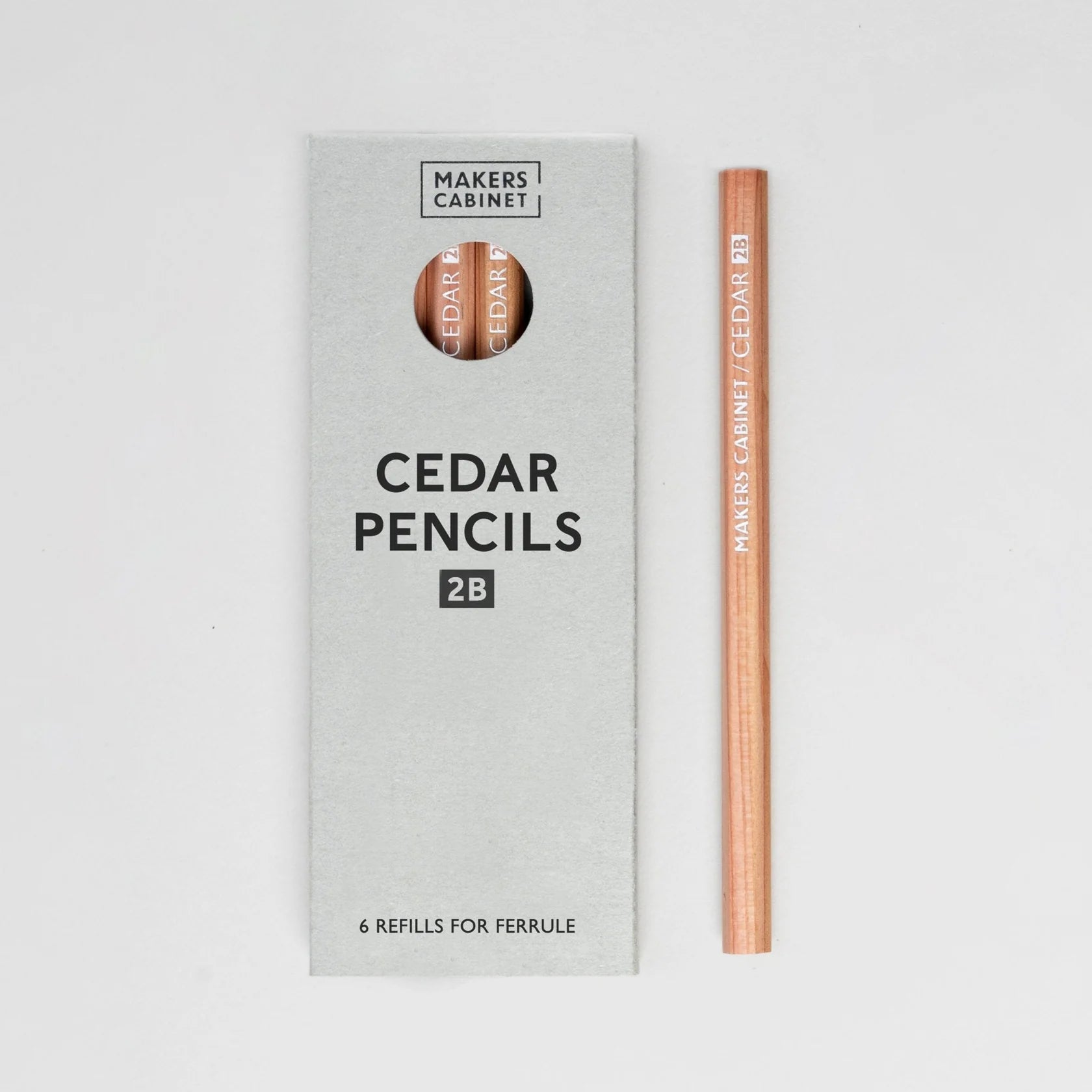 Makers Cabinet Cedar Pencils packaging with a pencil on a light gray background