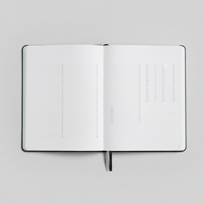 Open notebook with blank pages on a white background
