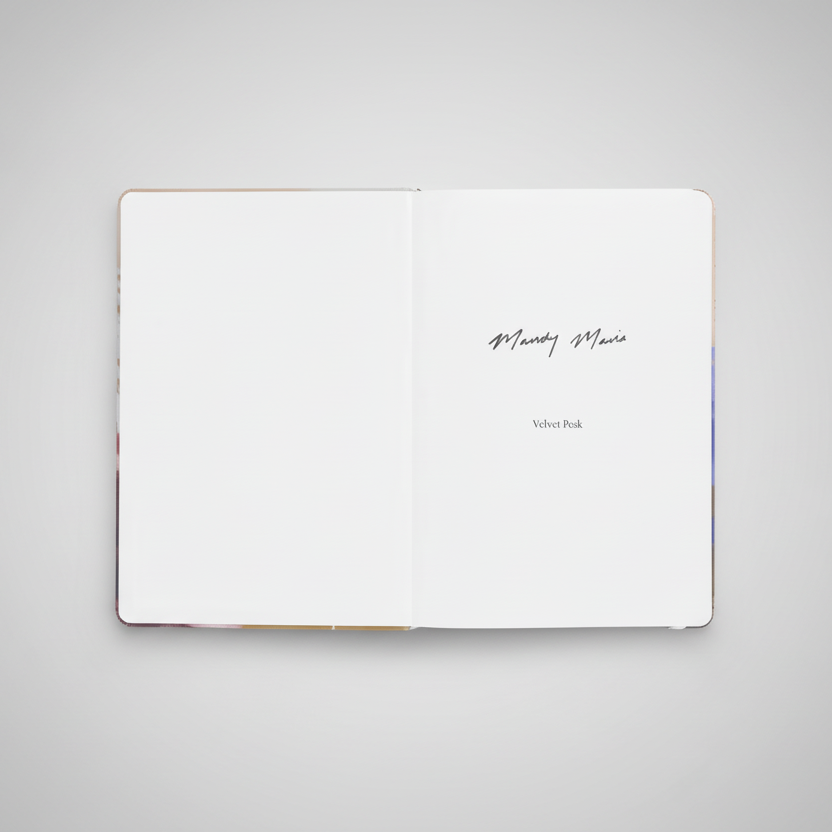 Open book with text on a white background
