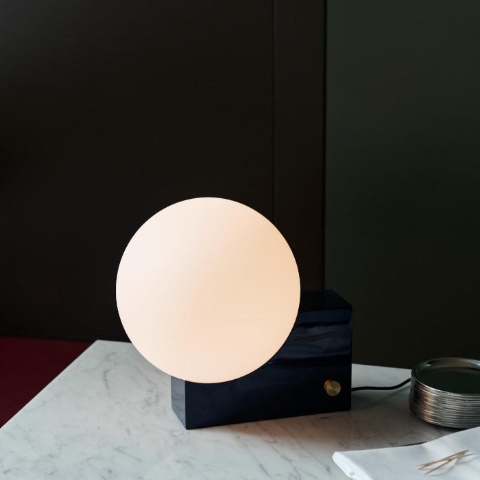 &Tradition, a Danish design brand that merges traditional craftsmanship with contemporary aesthetics, featuring furniture, lighting, and home accessories with timeless appeal.