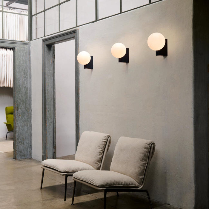 &Tradition, a Danish design brand that merges traditional craftsmanship with contemporary aesthetics, featuring furniture, lighting, and home accessories with timeless appeal.