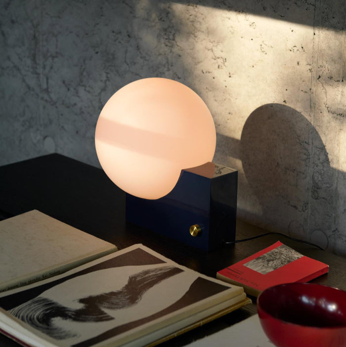 &Tradition, a Danish design brand that merges traditional craftsmanship with contemporary aesthetics, featuring furniture, lighting, and home accessories with timeless appeal.