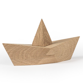 Wooden boat model on a white background