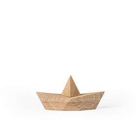 Wooden boat model on a white background