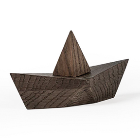 Wooden boat model on a white background