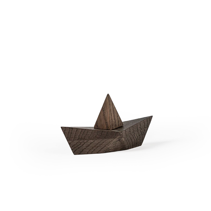 Wooden boat model on a white background