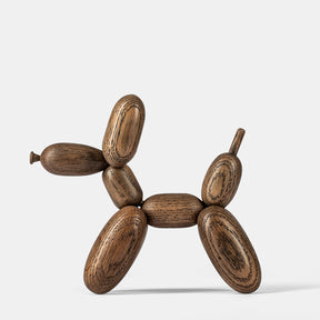 Wooden dog sculpture on a white background