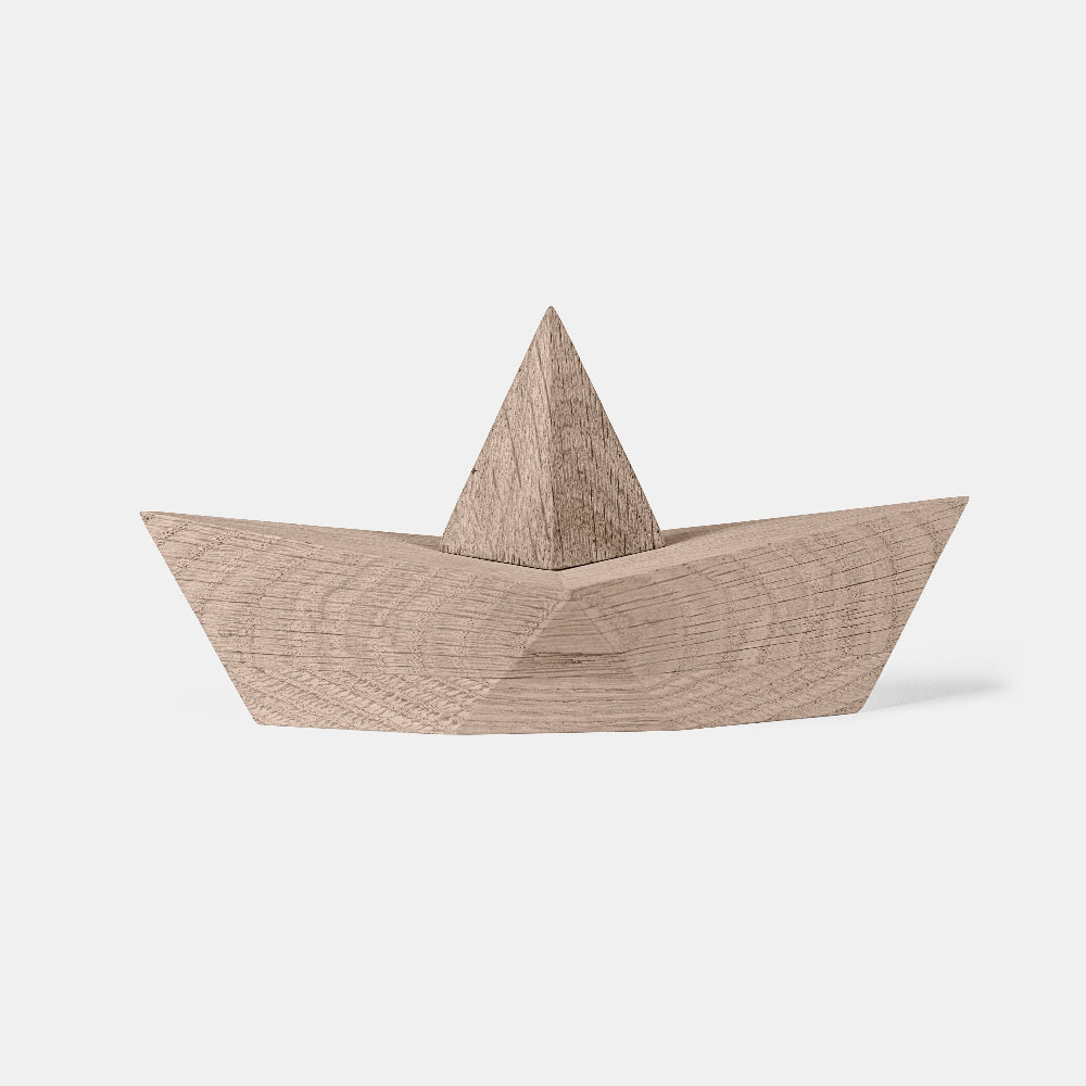 Wooden boat model on a white background