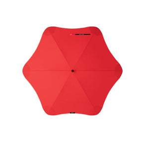 Red umbrella on a white background