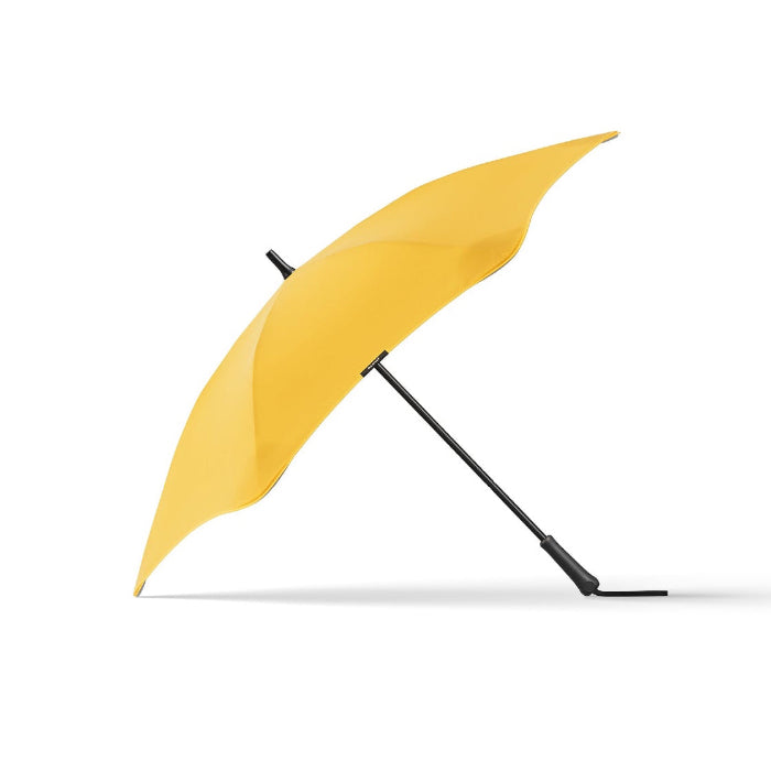 Yellow umbrella with black handle on a white background