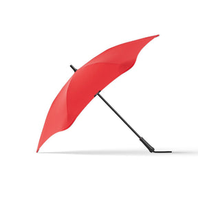 Red umbrella on a white background