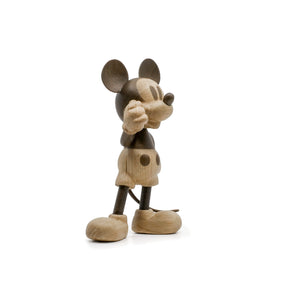 Wooden Mickey Mouse figurine on a white background