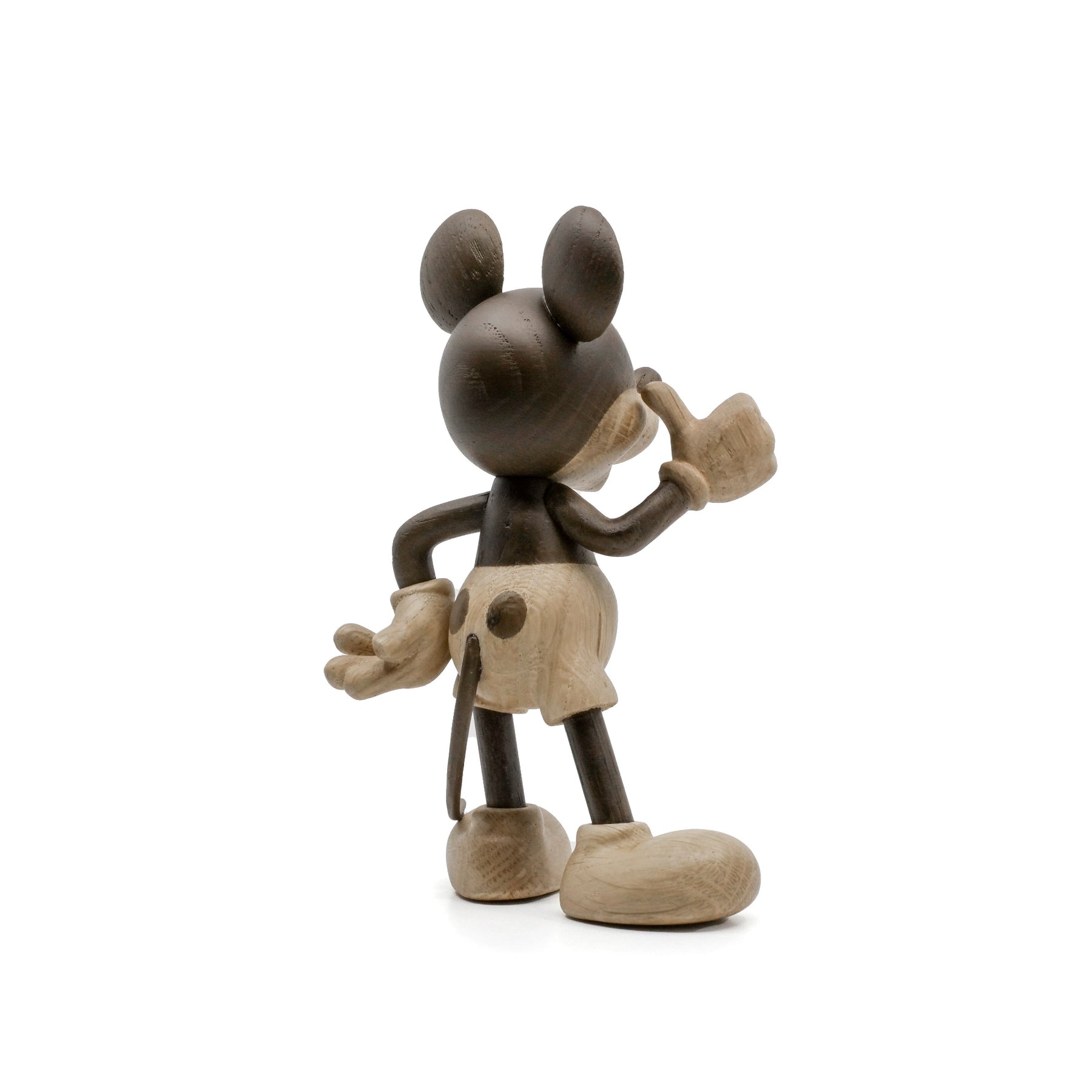 Wooden Mickey Mouse figure on a white background