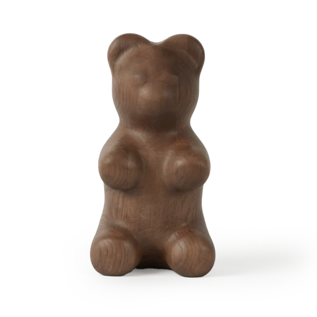 Wooden bear figurine on a white background