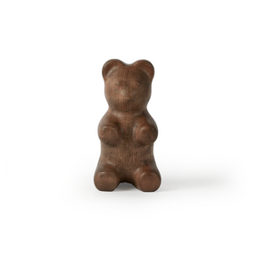 Wooden bear figurine on a white background