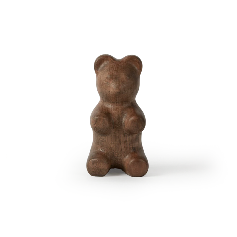 Wooden bear figurine on a white background