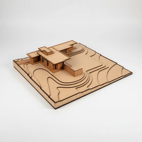 Wooden architectural model on a white background