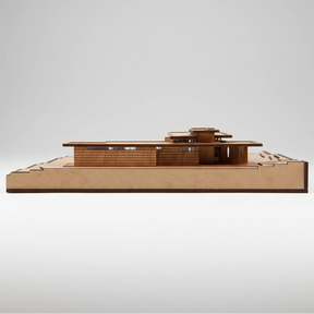 Wooden model of a modern building on a white background