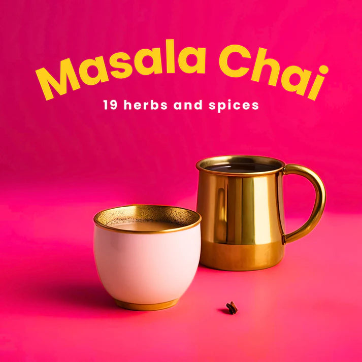 Two gold mugs with 'Masala Chai' text on a pink background