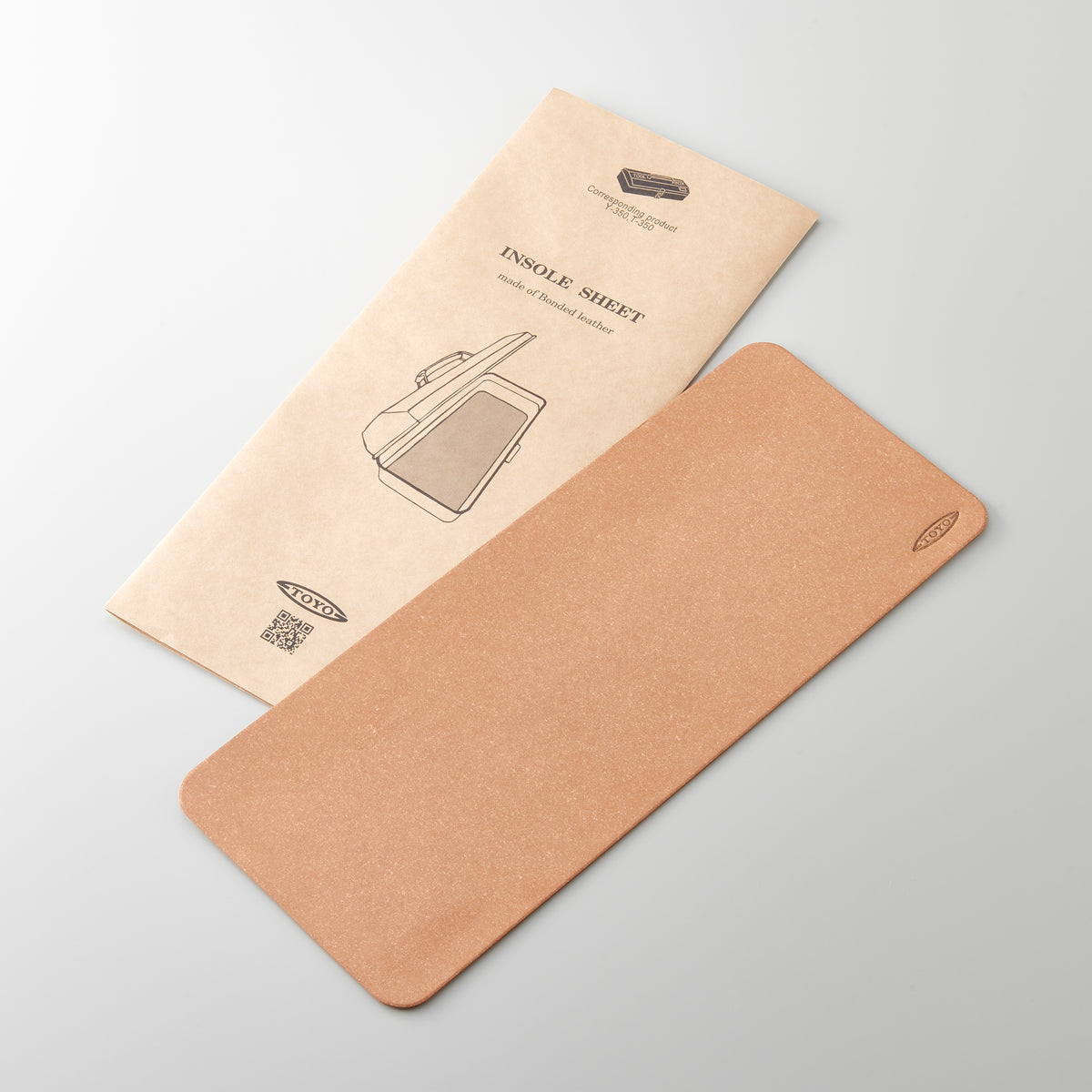 Brown insole sheet with packaging on a light gray background