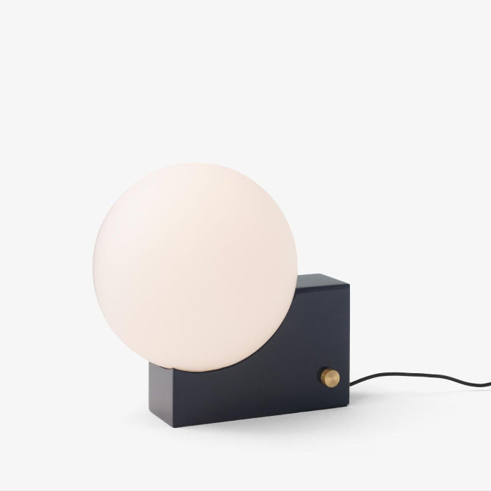 &Tradition, a Danish design brand that merges traditional craftsmanship with contemporary aesthetics, featuring furniture, lighting, and home accessories with timeless appeal.