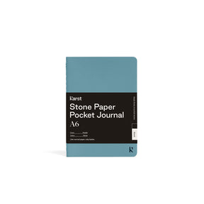 Blue pocket journal with 'Karst Stone Paper' branding on a white background