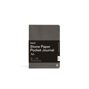 Gray pocket journal with 'karst' branding on a white background