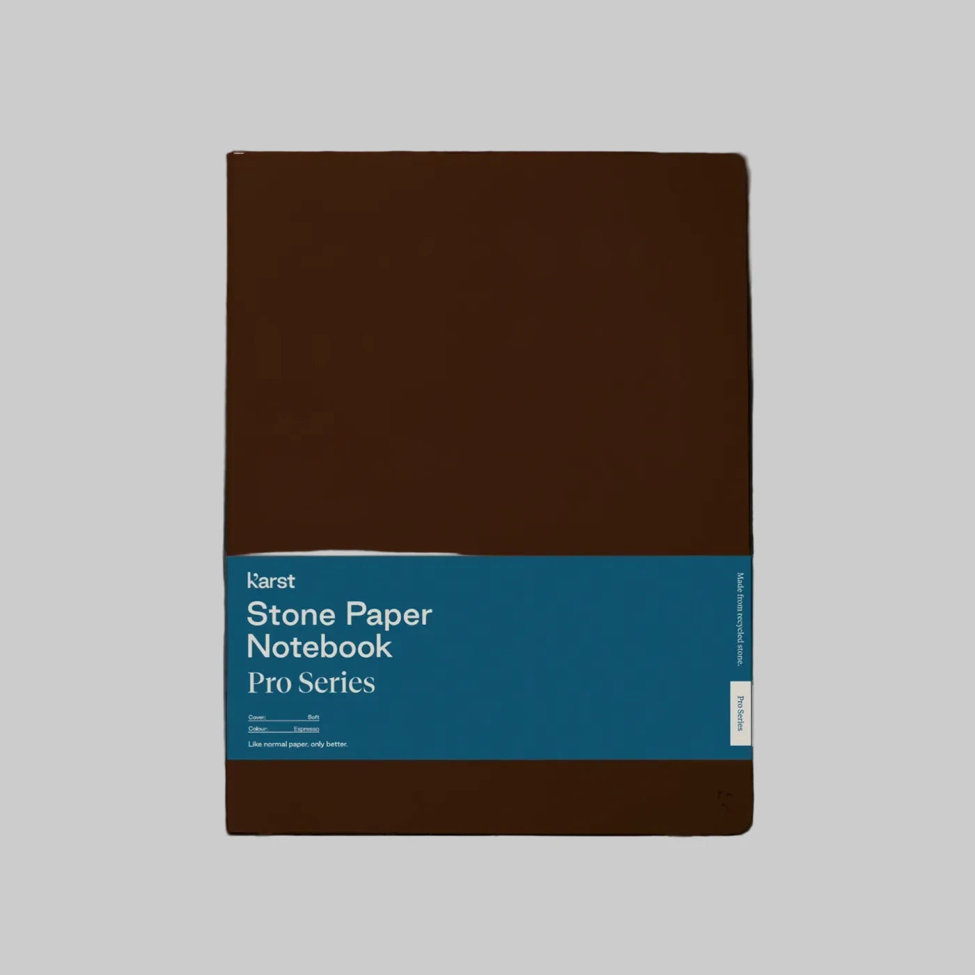 Karst Stone Paper Notebook Pro Series with an espresso brown cover and blue belly band, shown front-facing on a light gray background.