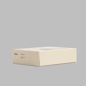 Beige box with 'Kast' branding on a white background