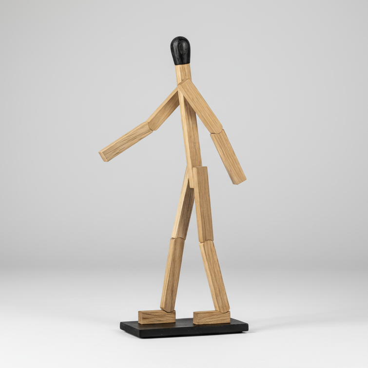 Wooden man sculpture on a white background