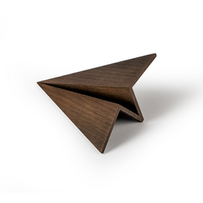 Wooden triangle-shaped object on a white background