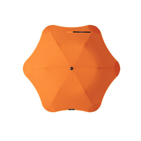 Orange umbrella on a white background