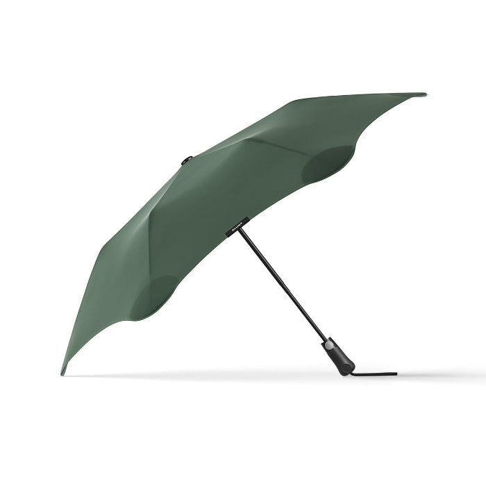 Green umbrella on a white background