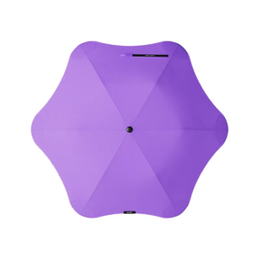 Purple umbrella on a white background