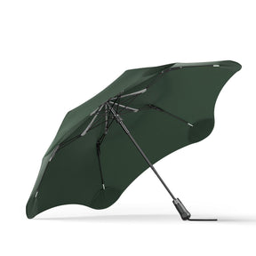 Green umbrella on a white background