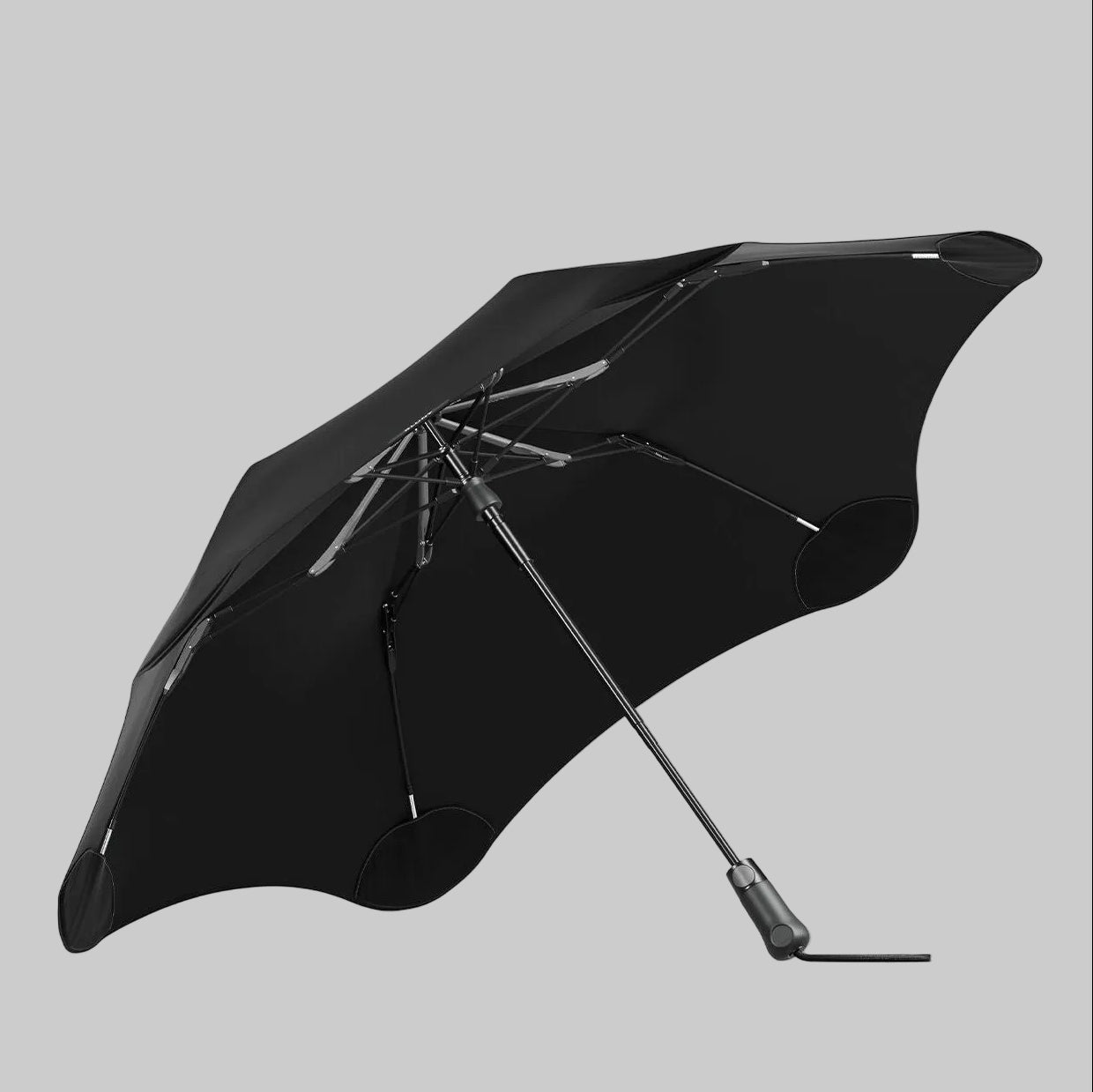 Black umbrella on a white background