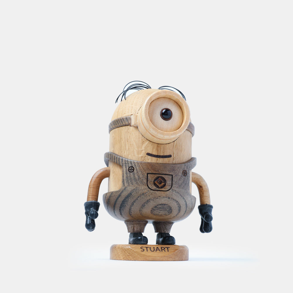 Wooden minion figurine with 'Stuart' on a white background
