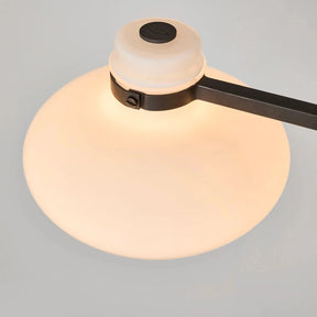 Modern ceiling light fixture on a gray background