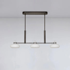 Modern pendant light fixture on a plain background