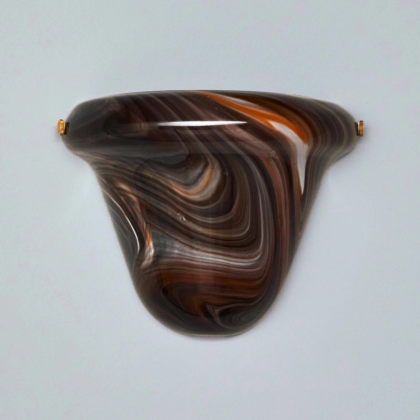 Marbled brown and black wall sconce on a light gray background