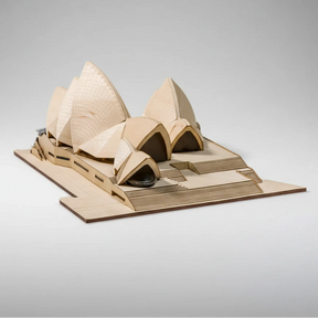 Cardboard model of the Sydney Opera House on a white background
